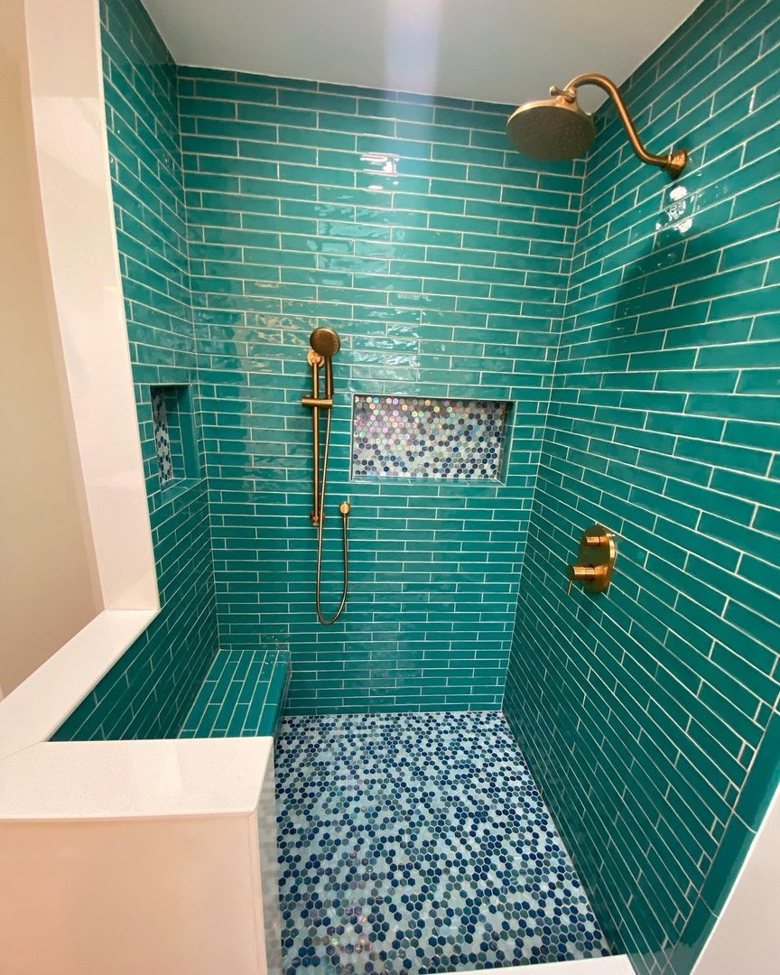 Teal Shower with Gold Fixtures